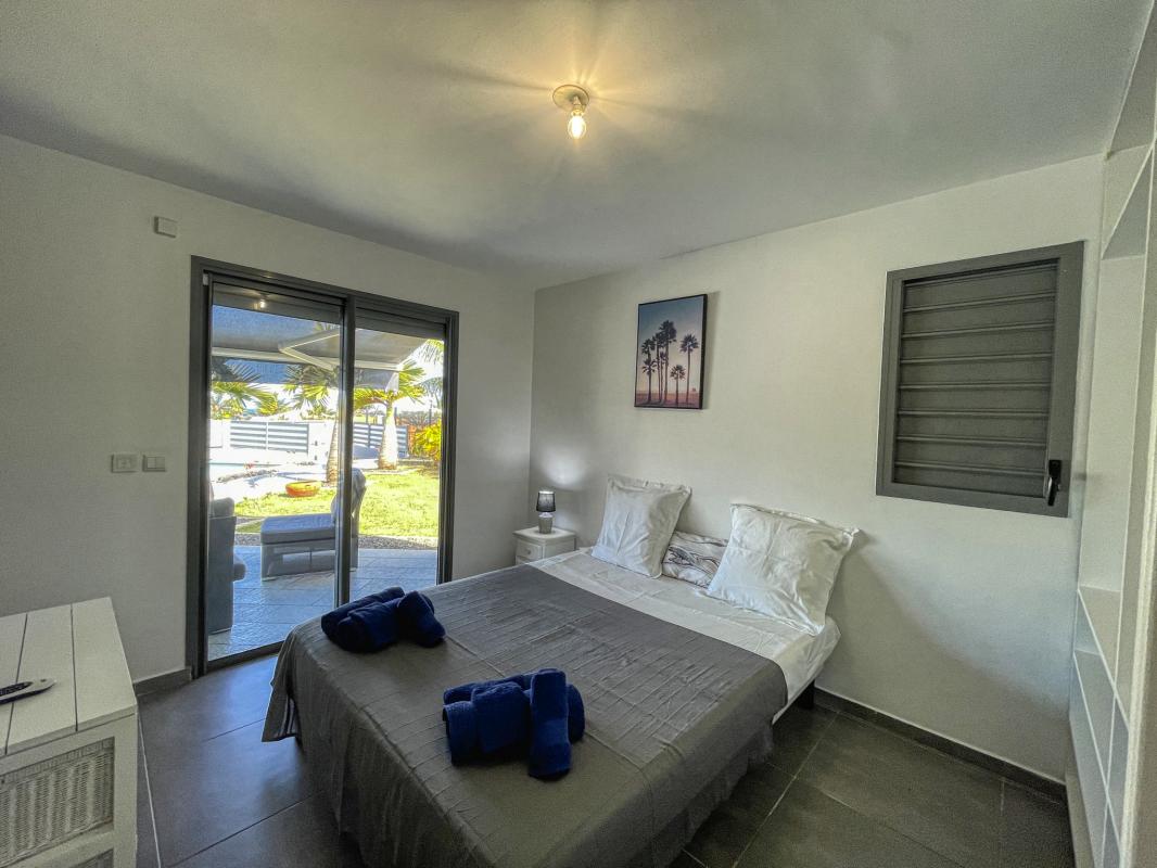 18 Location villa Andrea 3 chambres 6 personnes vue mer et piscine à sainte anne en guadeloupe - chambre 2